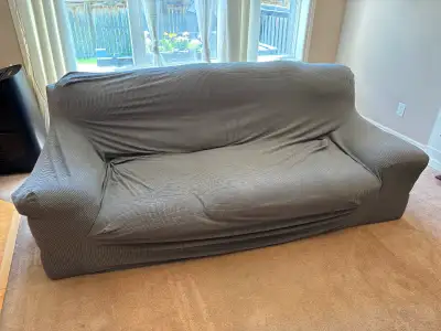 Comfortable couch with slipcover. Great for an apartment. Smaller size fits well through doors. Bene...