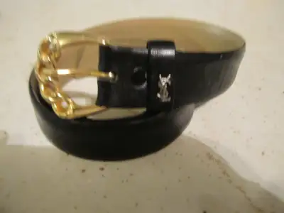 Selling a men's designer Yves St Laurent Paris luxury brand, black calfskin leather belt dress belt...