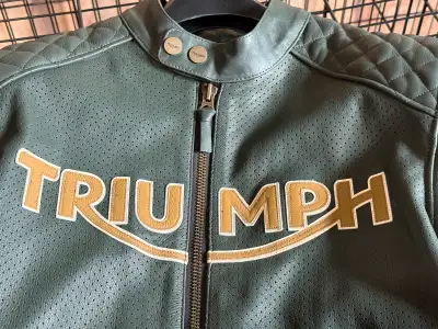 I'm selling a Triumph leather motorcycle jacket in medium size, perfect for any rider looking for bo...