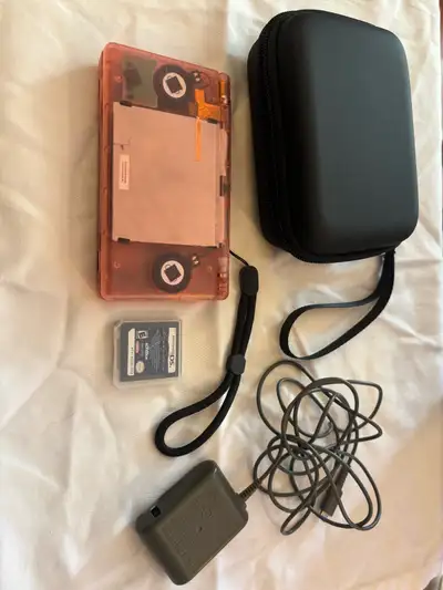Pink ds lite, new shell, comes with case, game and charger, $300 obo