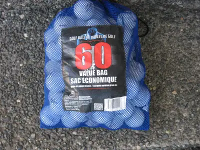 Bag of 60 golf balls , various makers.