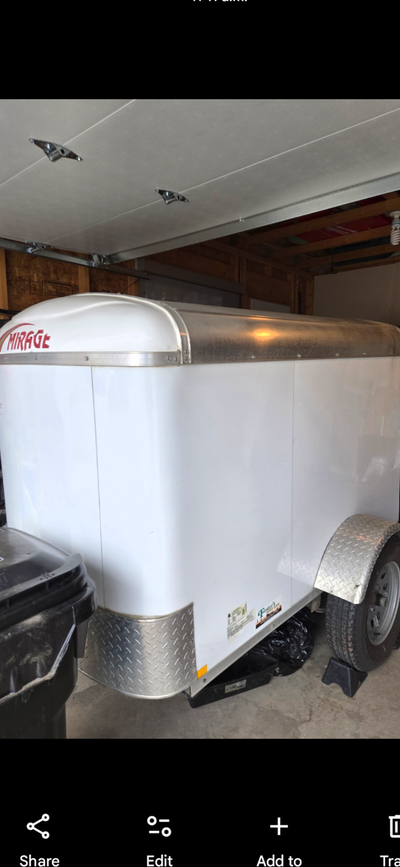 4x6 indoor stored with very little use quality build Mirage enclosed cargo trailer Aluminum body on...