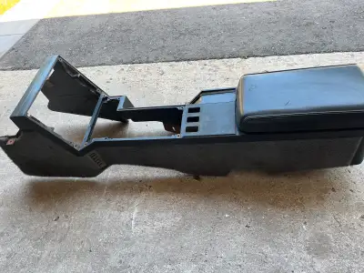 Third generation center console in good shape with no crack or breaks. Located in Richmond Hill. Rep...