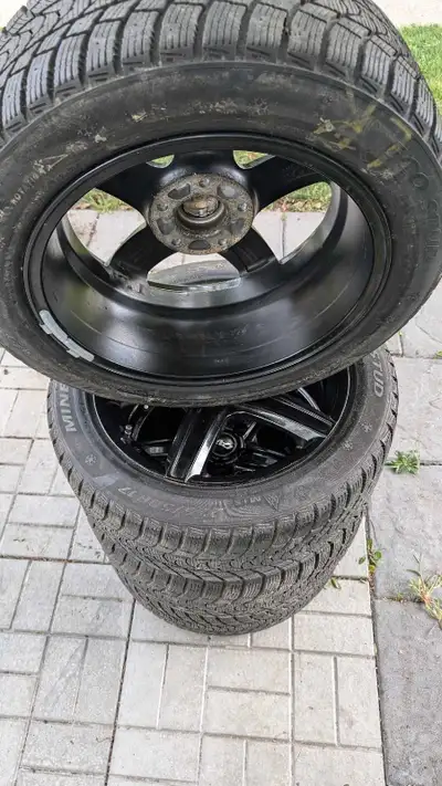 Selling a set of four Minerva Eco Stud winter tires mounted on rims. Size 225/50R17 98H. They are in...
