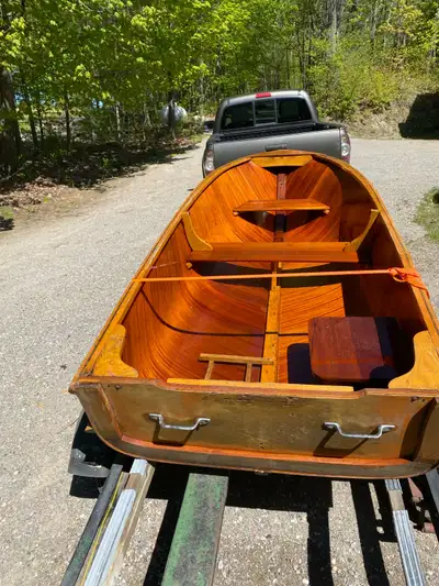Chestnut Canoe Company molded mahogany plywood boat in original condition. Interior has its original...