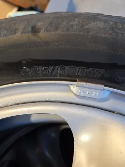 Rims and tires of a 2022 Subaru Forrester At least another year on tire more if occasional driver.