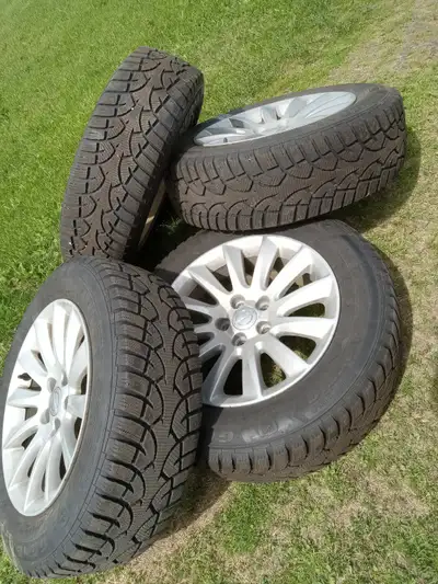 4 General Altimax Arctic winter tires was on Dodge Charger ,17/215/65 on factory aluminum rims