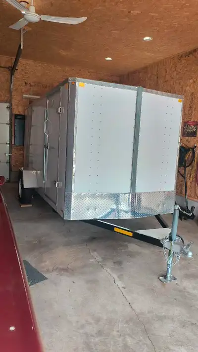 2012 Enclosed cargo trailer ,6'x12'.in very good shape Has all l.e.d lighting,2" ball,split rear fol...