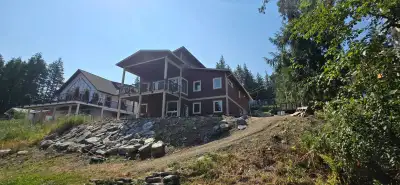 Located at 3044 Cedar Drive in beautiful Blind Bay, BC This open concept modern and energy efficient...