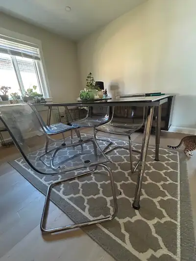 Glass table and ghost chairs, View more