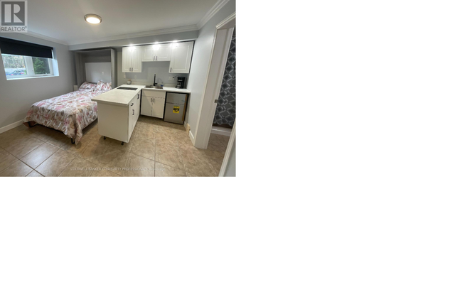 STUNNING BACHELOR CONDO