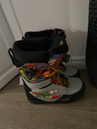 Brand new Rome snow board with bindings and thirtytwo boots