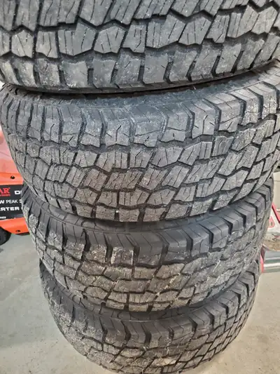 SET OF 4 RIMS AND TIRES FIT CHEV AND GMC 1500 275 65 18 M+S APROXIMATLEY 1400KM ON TIRES RIMS ARE DE...