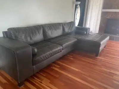 Faux leather sectional with ottoman 