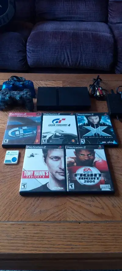 PS2 with 5 games, 2 controllers, cables, memory card, View more
