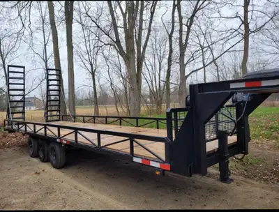 $15000 obo. This 28ft flatbed trailer has a newly painted, rust -resistant steel frame with 12" high...