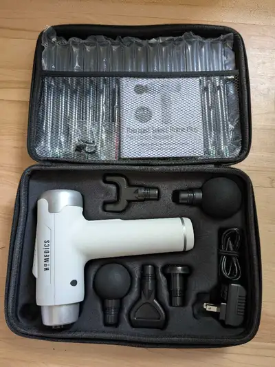 Homedics Massage Gun Great condition. Charges great and everything works. It is missing the trigger...