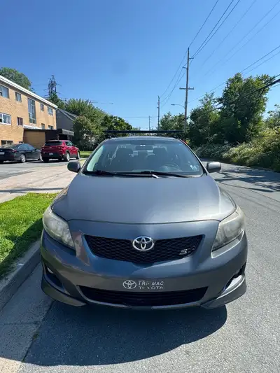 2010 Toyota Corolla Sport – For Sale • Sunroof • Roof rack • Alloy wheels • A/C and heater both work...