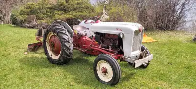 1954 NAA Ford tractor, snow/grader rear blade, 12 volt conversion, runs well. **Located in North Shu...
