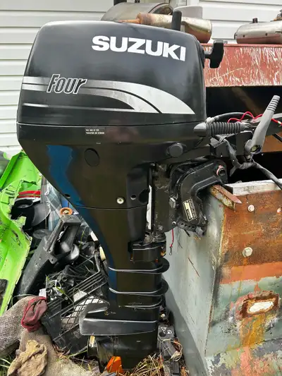 9.9 Suzuki 4 stroke long shaft with electric start recent service and ready to go. Easy start and ru...