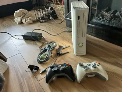 Xbox 360 console with remotes, View more