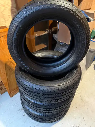 265 60 20 Bridgestone Dueler HT BRAND New and Driven just 500km. 4 Tires, all seasons, and sell for...