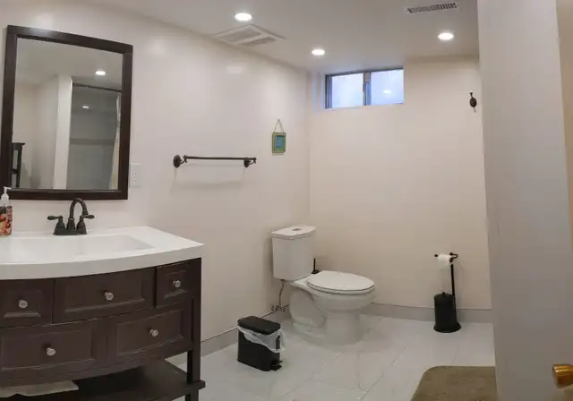 SPACIOUS BASEMENT APARTMENT ONE BLOCK FROM LESLIE SUBWAY STATION