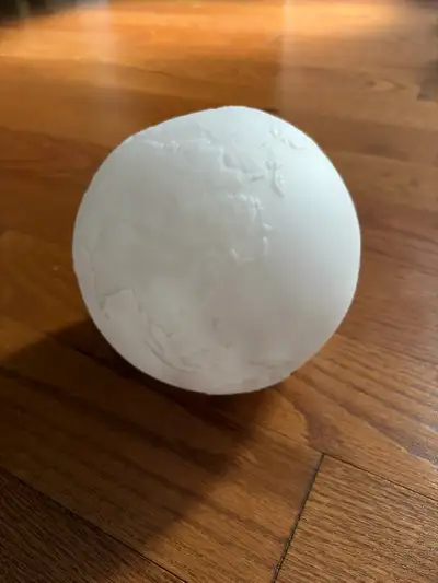 Earth globe lamp is in good condition and offers a unique, textured representation of the world that...