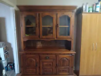 Hi ....I am selling my two piece antique ornament display cabinet..... 400 or best offer