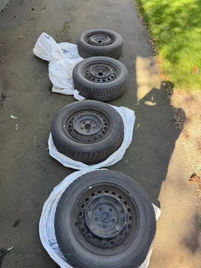 Used Bridgestone Blizzak WS70 winter tires size 205/65R16 95T are mounted on steel rims. These tires...