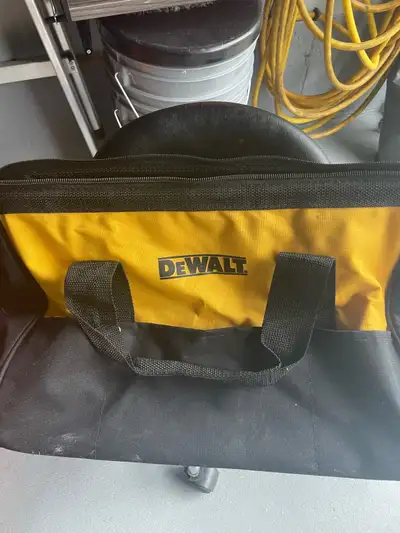 Keep your gear organized and protected with this durable and sturdy Dewalt tool bag, featuring a spa...