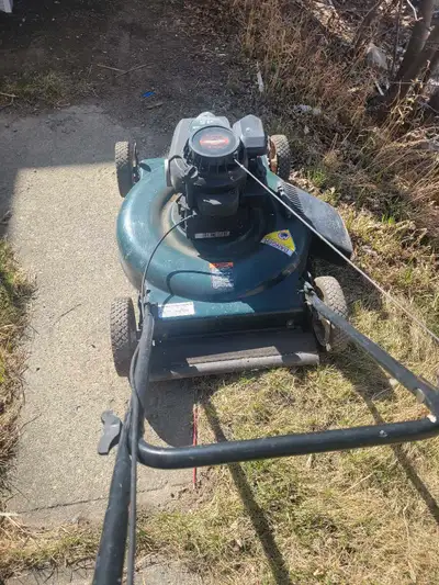 5hp NOT SELF propelled lawn mower.. starts easily. $40.00 NO STUPID OFFERS OR TRADES. SERIOUS ENQUIR...