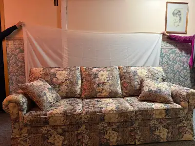 Queen sleeper couch in floral pattern, View more