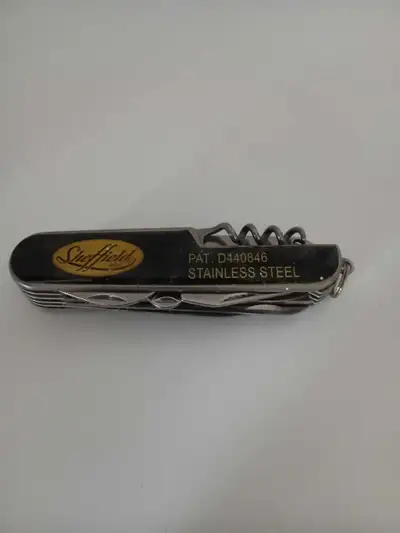 This Sheffield stainless steel multi-tool is a handy companion for various tasks, featuring a durabl...