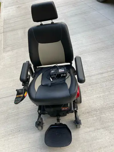 Vision Sport power scooter/wheelchair in very good condition - newer batteries and vinyl and armrest...
