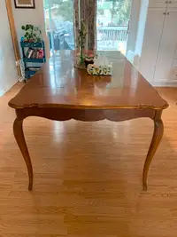 Dining table and 10 chairs for sale