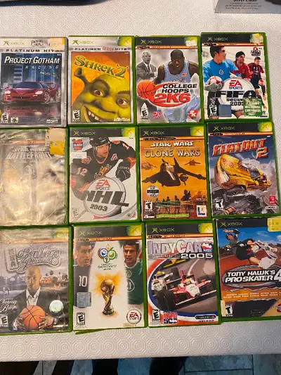 I am selling these Original Xbox games for the following prices: 1. FIFA Soccer 2005 - $6 2. College...