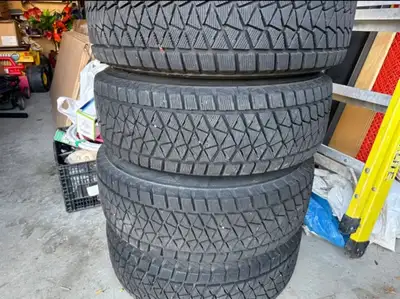 Winter tires by Bridgestone Blizzak DM-V2 with rims for sale. Major intersection highway 50 and Cast...