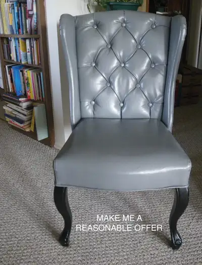 Leather 100%  chair tufted back. In VG cond. Accept offers. Grey, View more