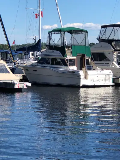 Set sail on a remarkable 1987 SeaRay 300 Fly-Bridge yacht, boasting a length of 30 feet and powered...
