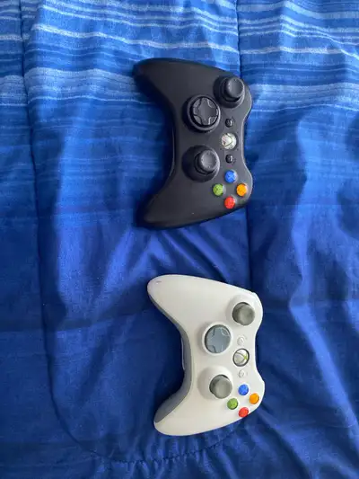 Please contact for more information one is missing a battery pack original Xbox controllers both wor...