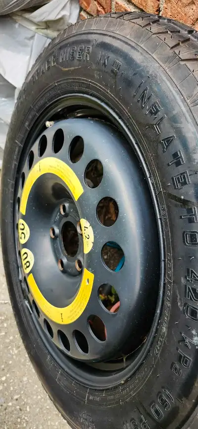 This is a Dunlop Space Miser spare tire, size T155/70R17, originally from a Mercedes Benz w211. This...