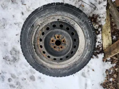 4 Toyota matrix steel winter rims with 205/55-16 snow tires that have weather cracking, $100 takes a...