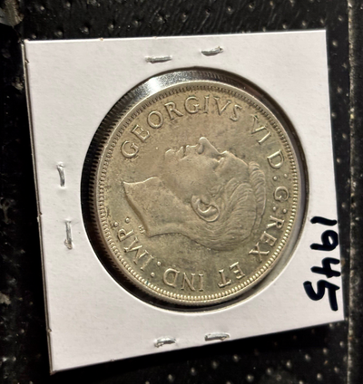 1945 CANADIAN SILVER DOLLAR VERY NICE L@@K PRICE IS FIRM,,,NOT ACCEPTING OFFERS,,so please dont ask!...