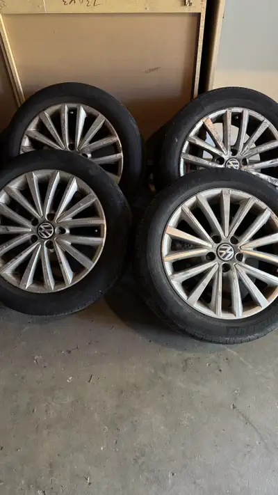OEM 17 inch VW wheels and tires from a 2011 VW Jetta. Tires are Michelin summers but are pretty old...