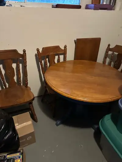 solid round pedestal table with leaf ext and 4 solid oak chairs, View more