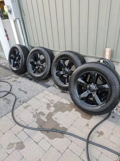 Selling factory Ram 1500 wheels with 275/60r20 Hankook Dynapro AT2 tires. All seasons with 3 peak sn...
