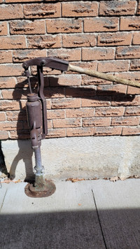 Antique cast iron water hand pump