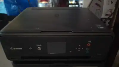 I'm selling a used Canon TS5020 printer that's still in good working condition, perfect for home or...