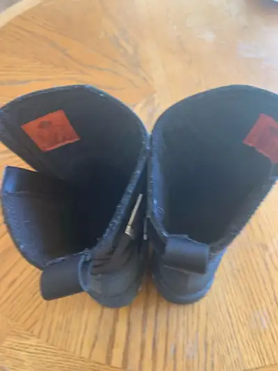 Step out in style with these Harley Davidson black leather boots, size 10. These boots are used, sho...